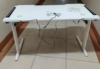 White electric height-adjustable standing desk, used, good condition