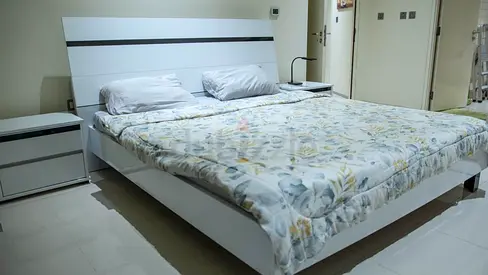 White modern queen bed frame with 2 matching bedside tables