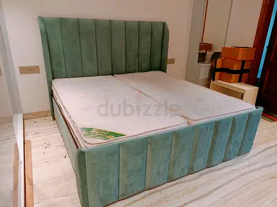 Green upholstered double bed frame - good condition