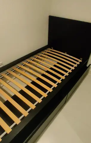 IKEA Malam single bed (90x200) with two handy storage drawers and a flawless mattress.