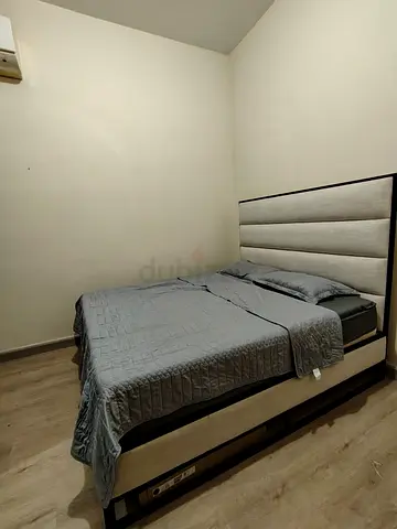 Queen upholstered bed frame with storage, light grey headboard