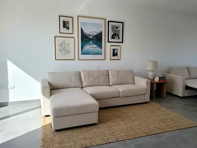 Premium-style corner sofa bed with soft cushions, wide sleeping area, and large storage space under