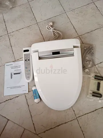 Electric Bidet Toilet Seat with Remote Controls — Not Used