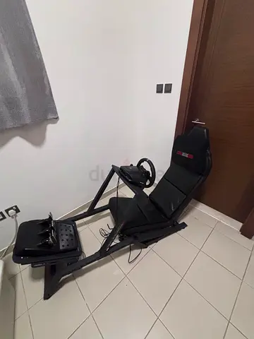 Full racing simulator cockpit (Next Level F-GT racing)  Logitech G923 Wheel base  Pedals