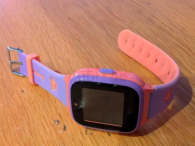Used pink kids smartwatch with silicone band - working condition