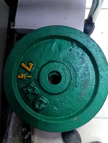 Set of Cast Iron Weight Plates (7 kg each) - Used, Good Condition