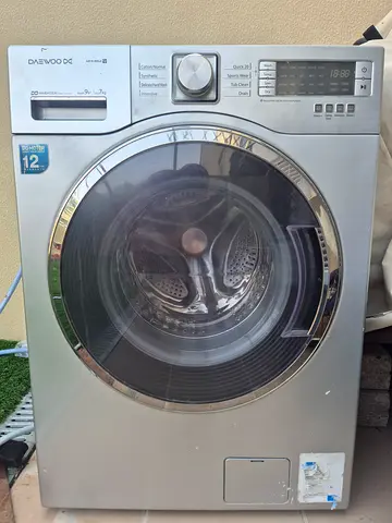 9kg Front load. Washing machine. Working well.