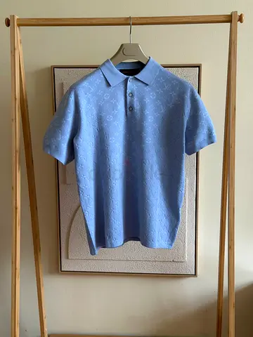 Light blue designer monogram short-sleeve polo - size medium
