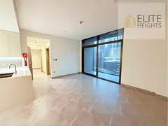 High-Floor 2BR | Peninsula Two | Burj & Canal Views | Open-Plan Layout