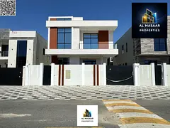 A villa with excellent finishing, featuring a majlis, two living rooms, and five master bedrooms. Fr