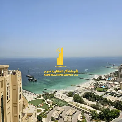 With a breathtaking sea view, a luxurious one-bedroom apartment, fully furnished with brand new, high-end furniture, and includes private parking.