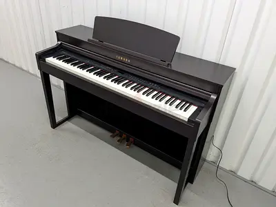 Yamaha Clavinova CLP 430 piano with bench. As good as new. Cash on free delivery with warranty.