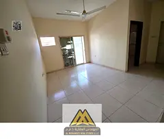 Annual 1BR apartment in Al Nuaimiya 2, ground floor, balcony, 2 bathrooms, prime location, AED 23,99