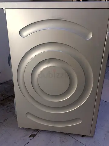 Used front-load washing machine (silver) - good working condition