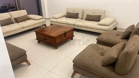 Alhuzaifa furniture beige/ brown  alcantara sofa set with ottoman original price 19000AED