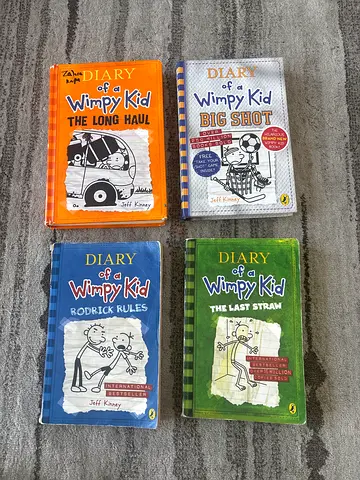 Diary of a wimpy kid book set of 4 by Jeff Kinney
