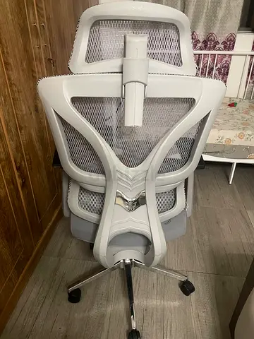 White ergonomic mesh office chair with lumbar support