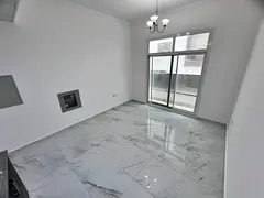Studio in Al Jurf 3 near China Market, balcony, modern finishing and central AC.