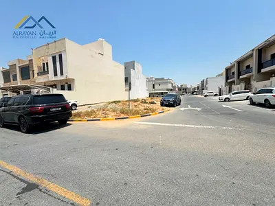**For Sale – Two Corner Residential Investment Plots in Al Yasmeen – Ajman**