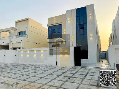 Including registration and ownership fees for sale: Modern villa in Al Helio 2, Ajman, ground + first floor, 5 spacious bedrooms, separate majlis, lar