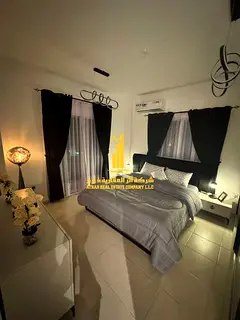 Cheapest two-bedroom apartment in Ajman - Al Rawda 3 - Sheikh Ammar Street - furnished with high-end