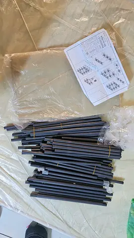 Set of metal frame poles and connectors – unused, with instructions