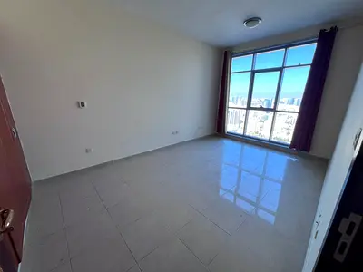 Three bedrooms and a living room duplex in the Residency Towers, Ajman Corniche, for only 100,000.