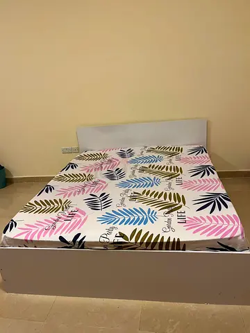 white bed with mattress