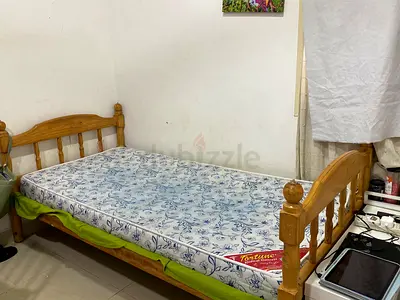 Single wooden bed