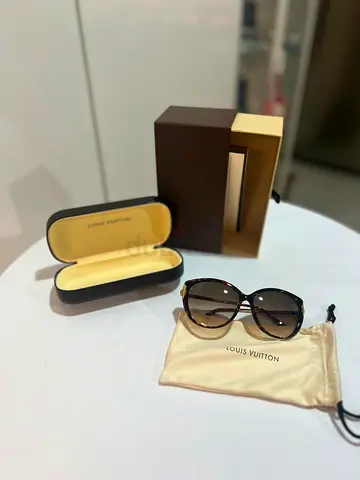 Louis Vuitton womens designer sunglasses with original case and pouch
