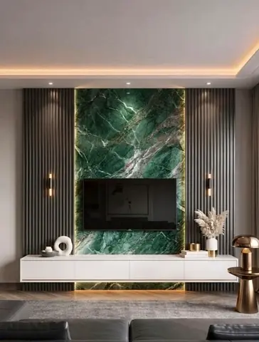 Modern living room TV wall with green marble feature panel and white console