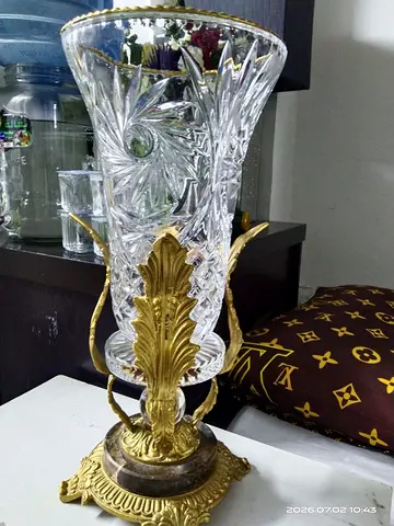 Elegant Crystal Vase with Ornate Gold Base
