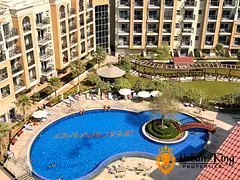 Bright 2BR with Maids room Apartment | Pool & Downtown View | Balcony
