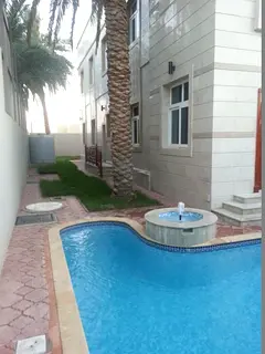 illa in Al Azra, Sharjah, offering spacious living areas, a peaceful location, and a luxurious desig