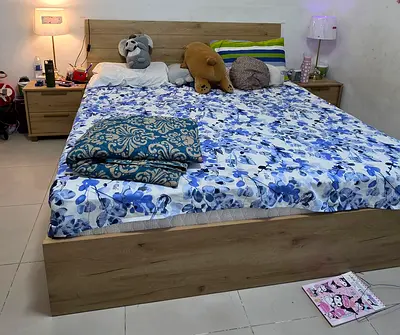 Queen wooden bed frame with matching bedside tables - good condition
