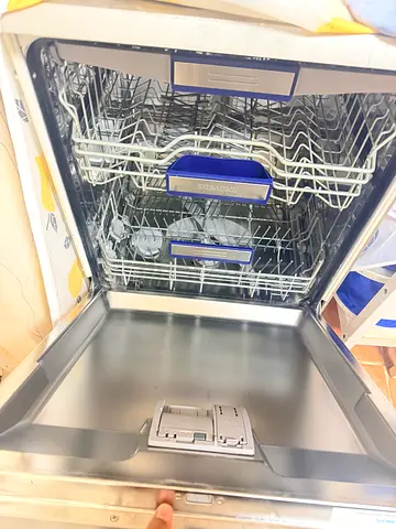 Stainless steel built-in dishwasher in good working condition
