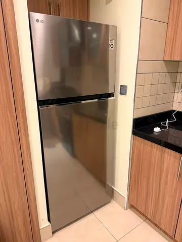 LG Stainless Steel Top Freezer Refrigerator - Good Condition