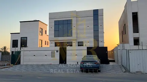 A villa in Al Zahia, with an area of ​​3014 sq ft, two floors, four master bedrooms, a living room