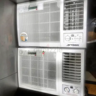 Two used Aftron window air conditioners - working condition