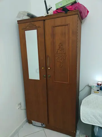 Wooden 2-door wardrobe with mirror — good condition