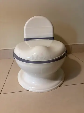 Simple white baby potty chair, good condition