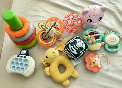 Mixed baby rattles, teethers and soft toys set - gently used