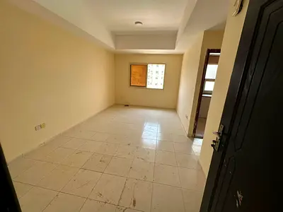 For annual rent: a beautiful one-bedroom apartment in Al Nuaimiya 2, on College Street, with central air conditioning and card access to the building.