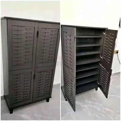 Tall brown storage cabinet with multiple shelves - good condition