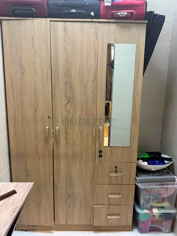 3-door wooden wardrobe with mirror and 3 drawers - good condition