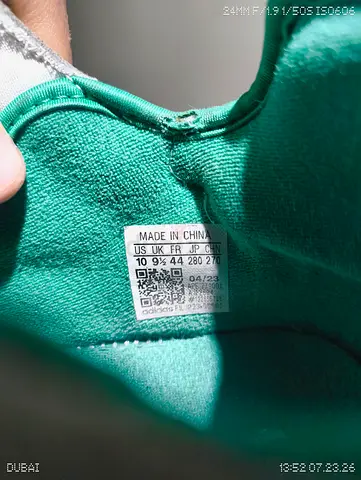 Used green athletic sneakers (size US 10 1/2) - good condition
