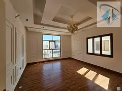 Spacious 5-bedroom family villa with utilities included, priced at AED 105,000.