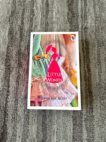 Little woman book by Louisa May Alcott