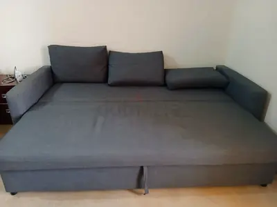 Grey convertible sofa bed with box - good condition