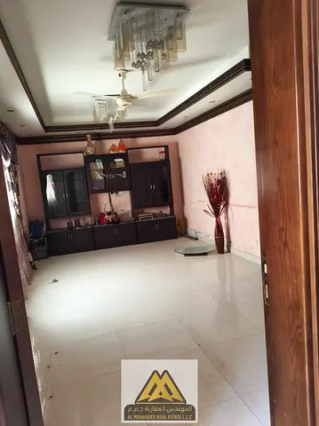 A traditional Arabic house in Al Rashidiya 3 area, consisting of 4 rooms, a majlis (formal sitting